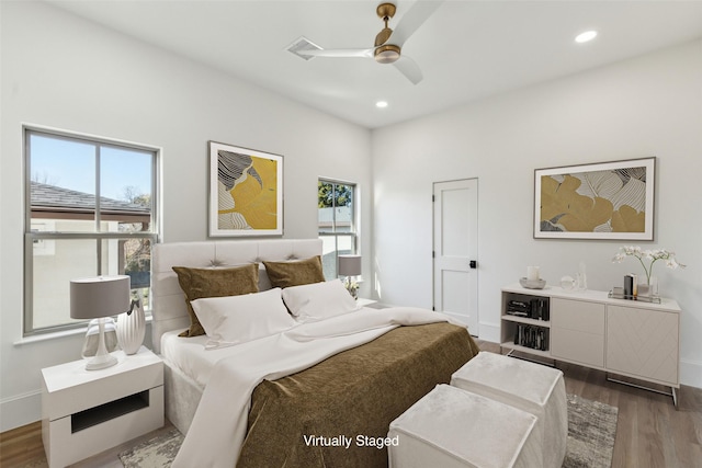 bedroom featuring dark wood-type flooring and ceiling fan