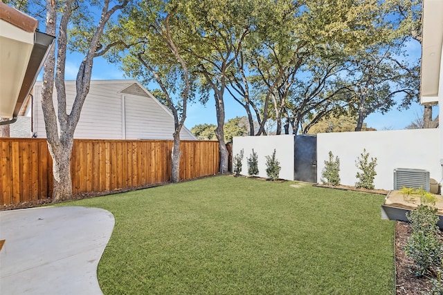 view of yard with central AC unit