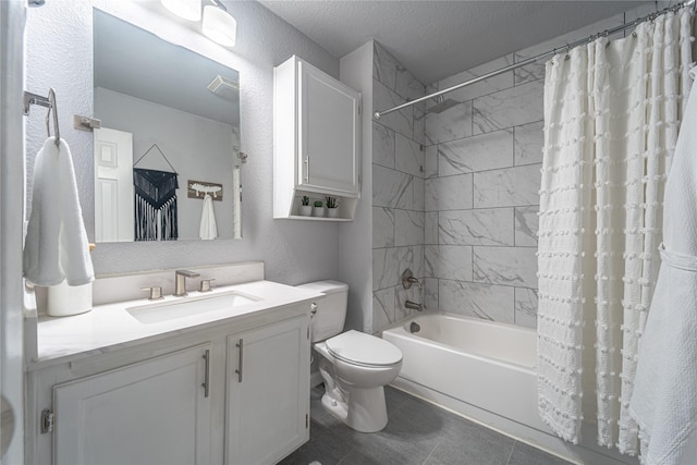 full bathroom featuring toilet, a textured ceiling, tile patterned flooring, shower / bath combo, and vanity