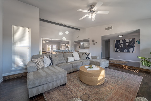 living room featuring ceiling fan, dark hardwood / wood-style flooring, and lofted ceiling