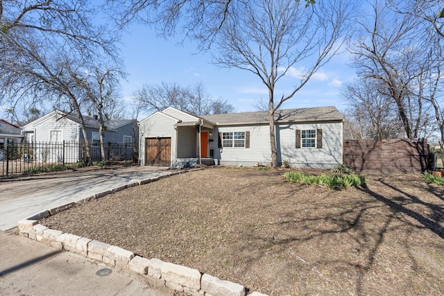 ranch-style home featuring a garage