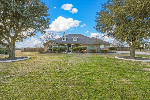 view of front of home with a front lawn