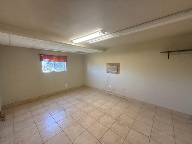 basement featuring an AC wall unit