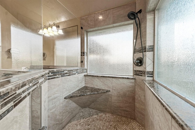 bathroom featuring tiled shower