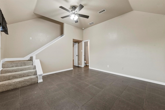 interior space with vaulted ceiling and ceiling fan