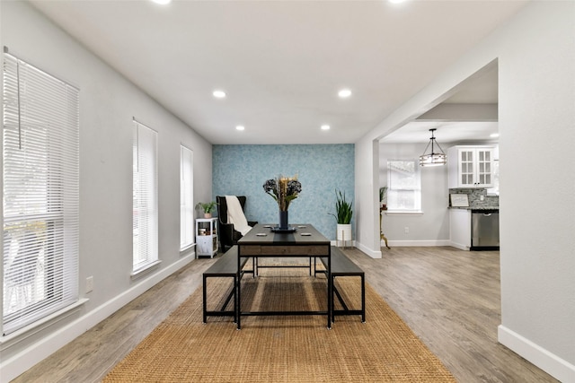 office space with light hardwood / wood-style floors