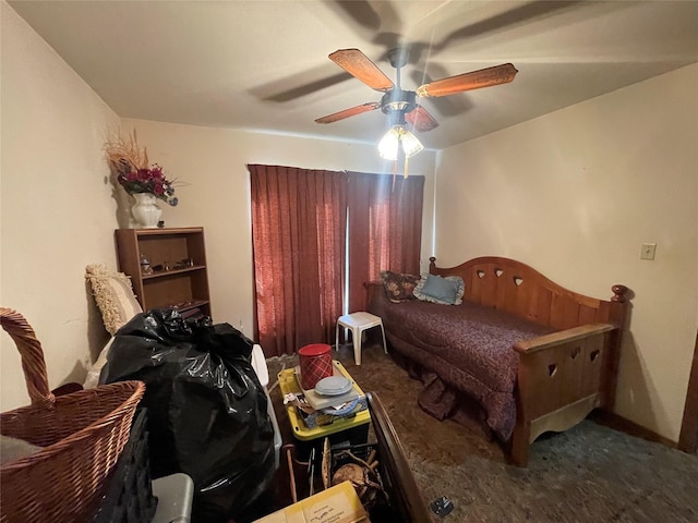 bedroom with ceiling fan and carpet