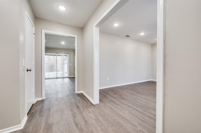 hallway featuring light hardwood / wood-style flooring