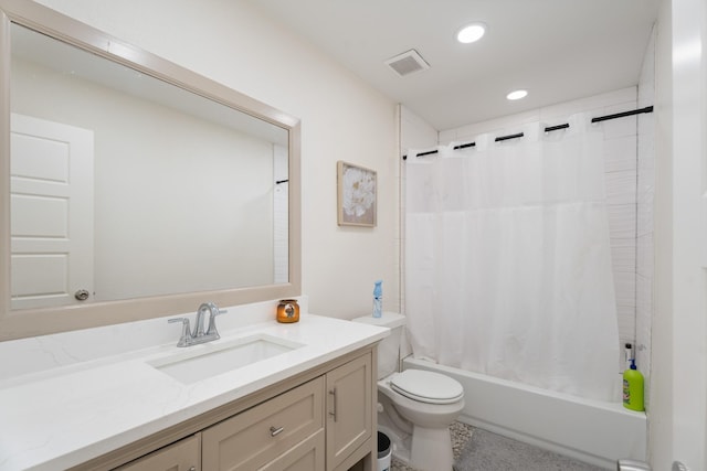 full bathroom featuring vanity, toilet, and shower / bath combo