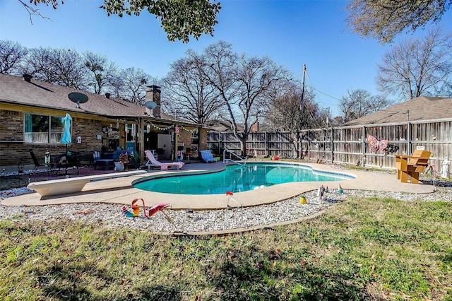 view of pool featuring a patio