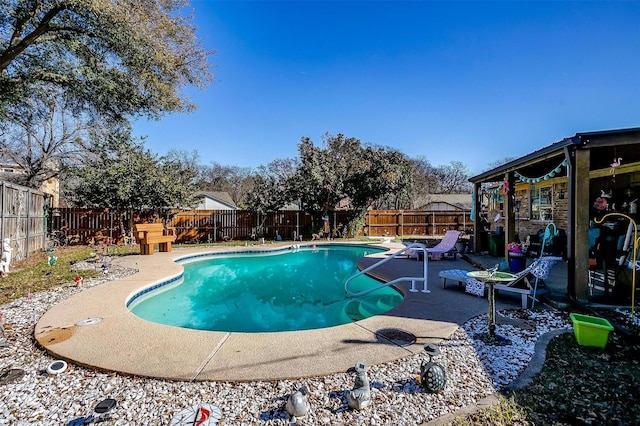 view of swimming pool featuring a patio