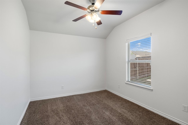 unfurnished room with vaulted ceiling, carpet, and ceiling fan