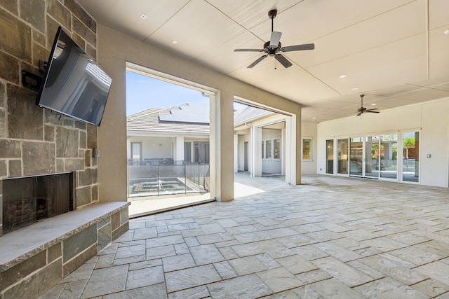 view of patio / terrace featuring ceiling fan