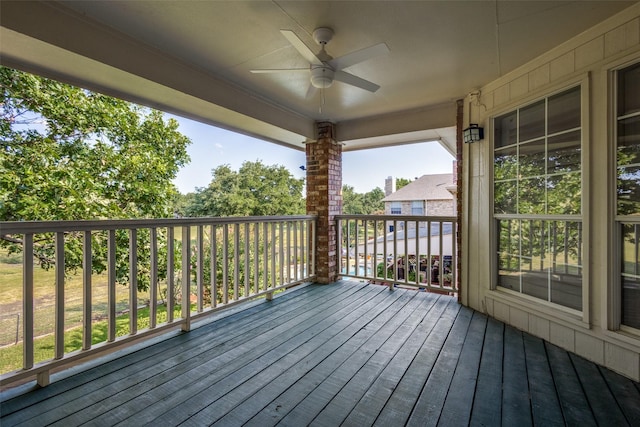 wooden deck with ceiling fan