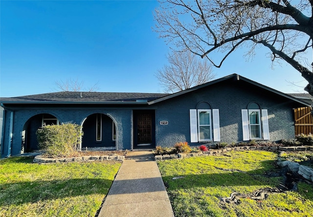 1721 Melrose St, Garland, TX 75042 - ranch-style home featuring brick siding and a front yard