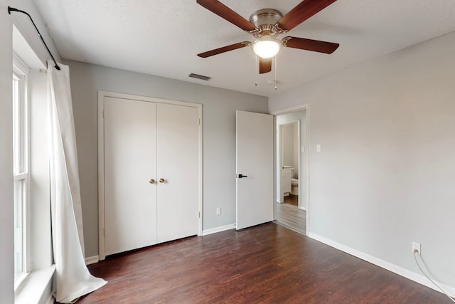 1721 Melrose St, Garland, TX 75042 - unfurnished bedroom with visible vents, ceiling fan, baseboards, wood finished floors, and a closet
