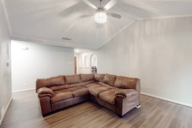 1721 Melrose St, Garland, TX 75042 - living area featuring visible vents, light wood-style flooring, crown molding, and vaulted ceiling