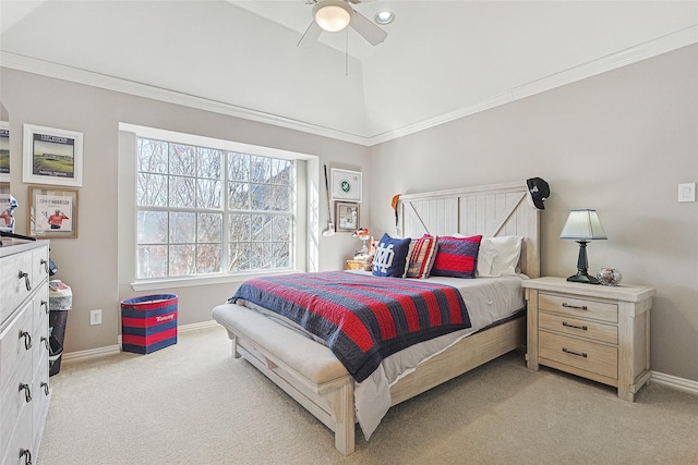 bedroom featuring ceiling fan, ornamental molding, and light colored carpet