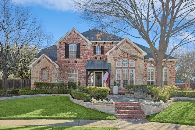 view of front of home with a front yard