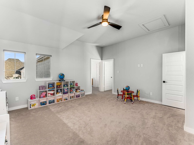 game room featuring light carpet and ceiling fan