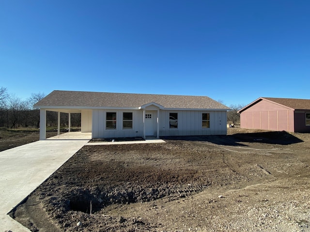 view of front of house with a carport