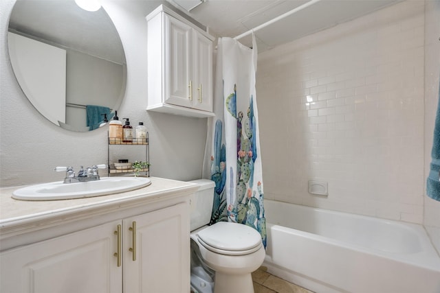 full bathroom with vanity, tile patterned floors, toilet, and shower / bath combo