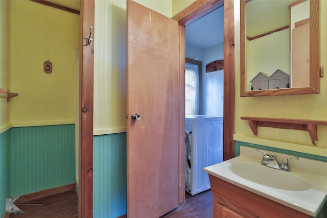 bathroom featuring hardwood / wood-style floors and vanity