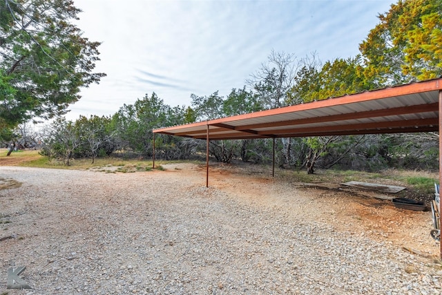 exterior space featuring a carport