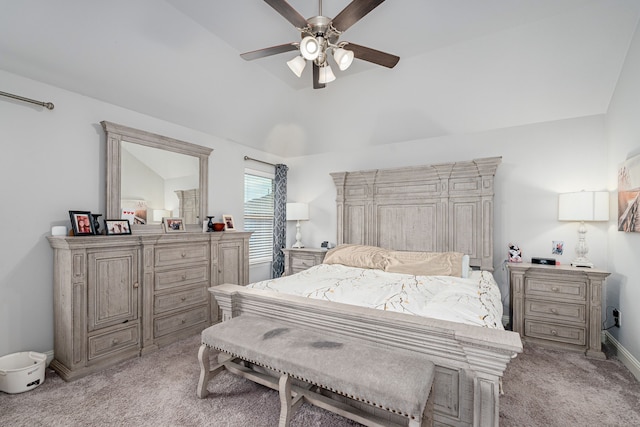 bedroom featuring ceiling fan, light carpet, and vaulted ceiling