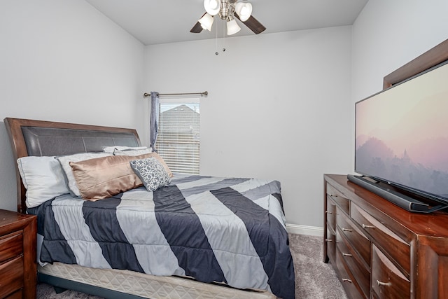 bedroom with ceiling fan and carpet floors