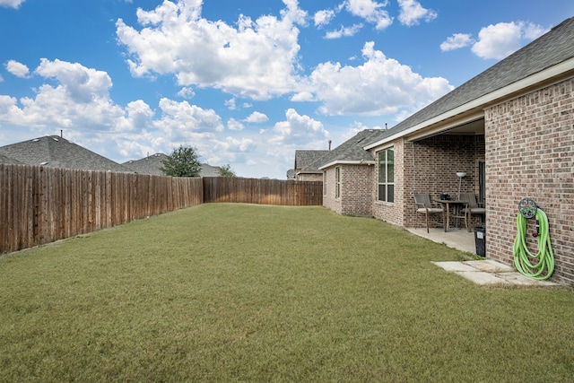 view of yard with a patio area