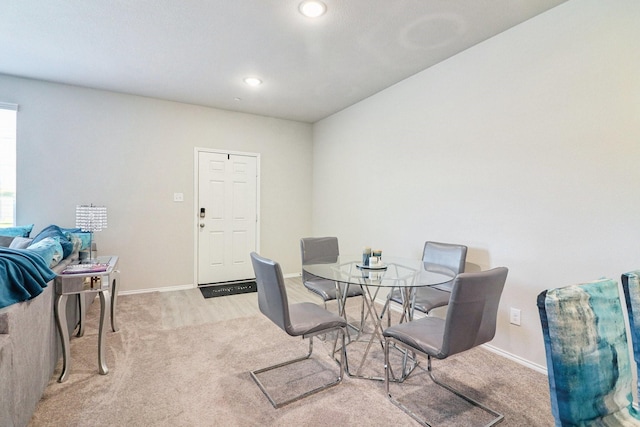 view of carpeted dining area