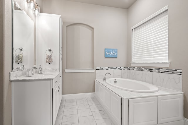 bathroom featuring vanity and a bathtub