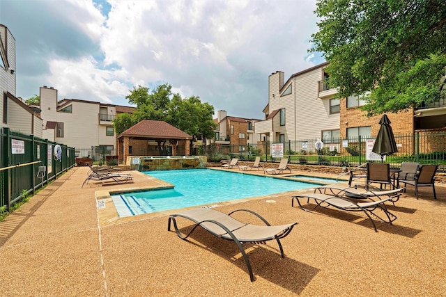 view of pool featuring a gazebo and a patio