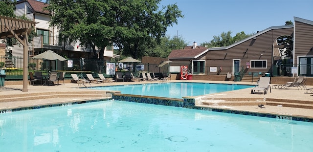 view of pool featuring a patio and pool water feature