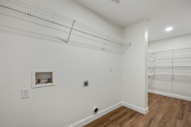 laundry area featuring electric dryer hookup, hardwood / wood-style floors, and hookup for a washing machine