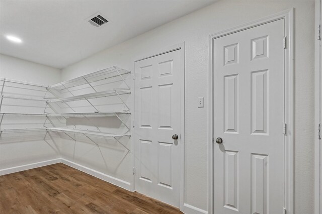 interior space with hardwood / wood-style floors