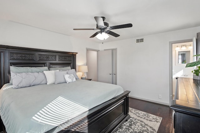 bedroom with ceiling fan and dark hardwood / wood-style flooring