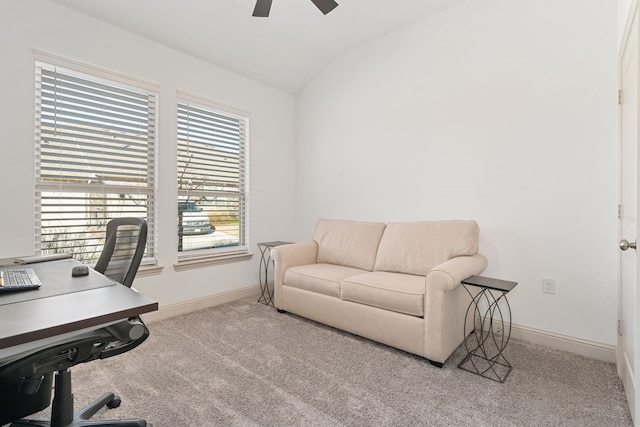 office with lofted ceiling, light colored carpet, and ceiling fan