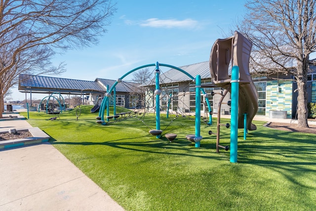 view of playground featuring a lawn