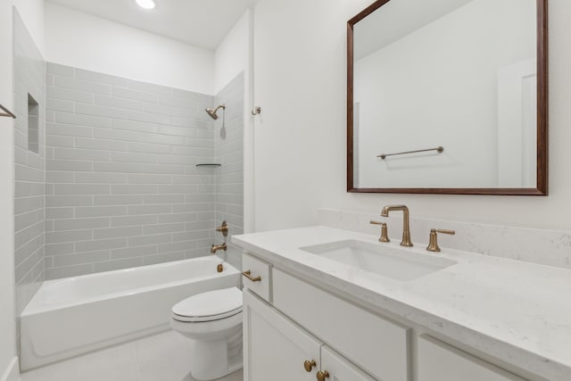 full bathroom with tiled shower / bath, vanity, toilet, and tile patterned flooring