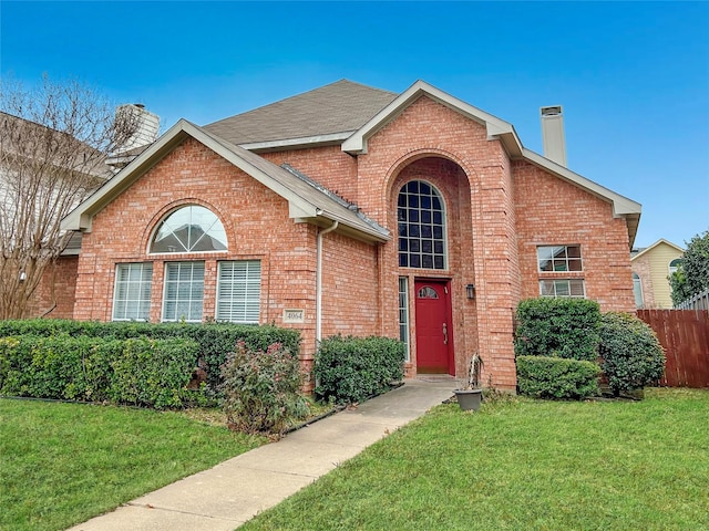 view of property featuring a front yard