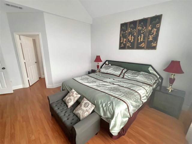 bedroom featuring hardwood / wood-style floors