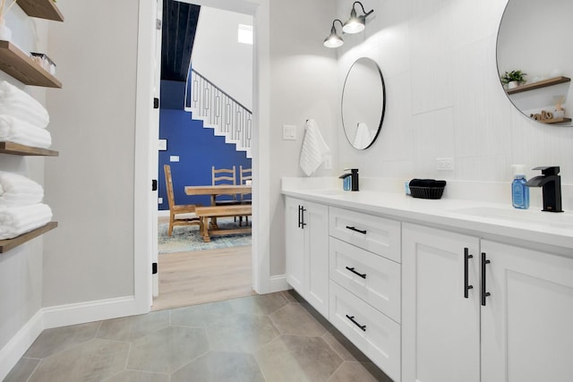 bathroom with vanity and tile patterned flooring