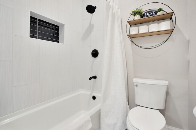 bathroom with toilet and shower / bath combo