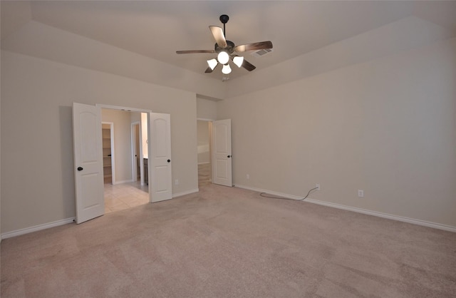 unfurnished bedroom with ceiling fan and light colored carpet