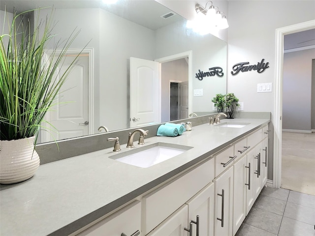 bathroom featuring vanity and tile patterned flooring