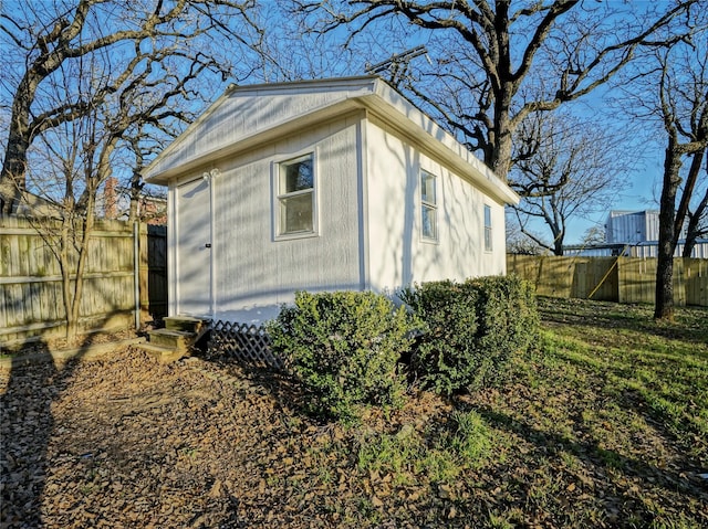 view of home's exterior featuring an outdoor structure