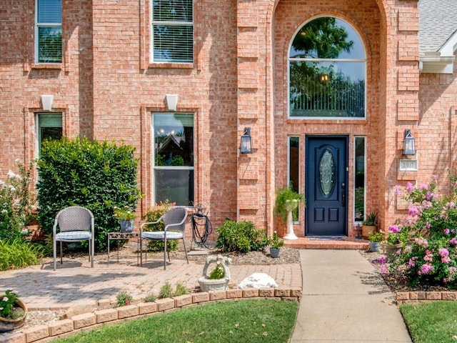 doorway to property with a patio