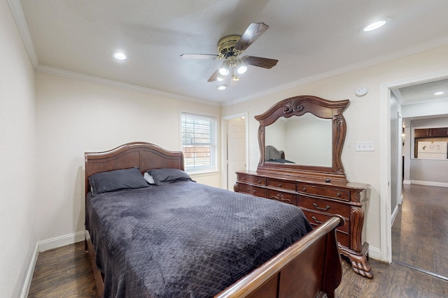 bedroom featuring crown molding, dark hardwood / wood-style floors, and ceiling fan